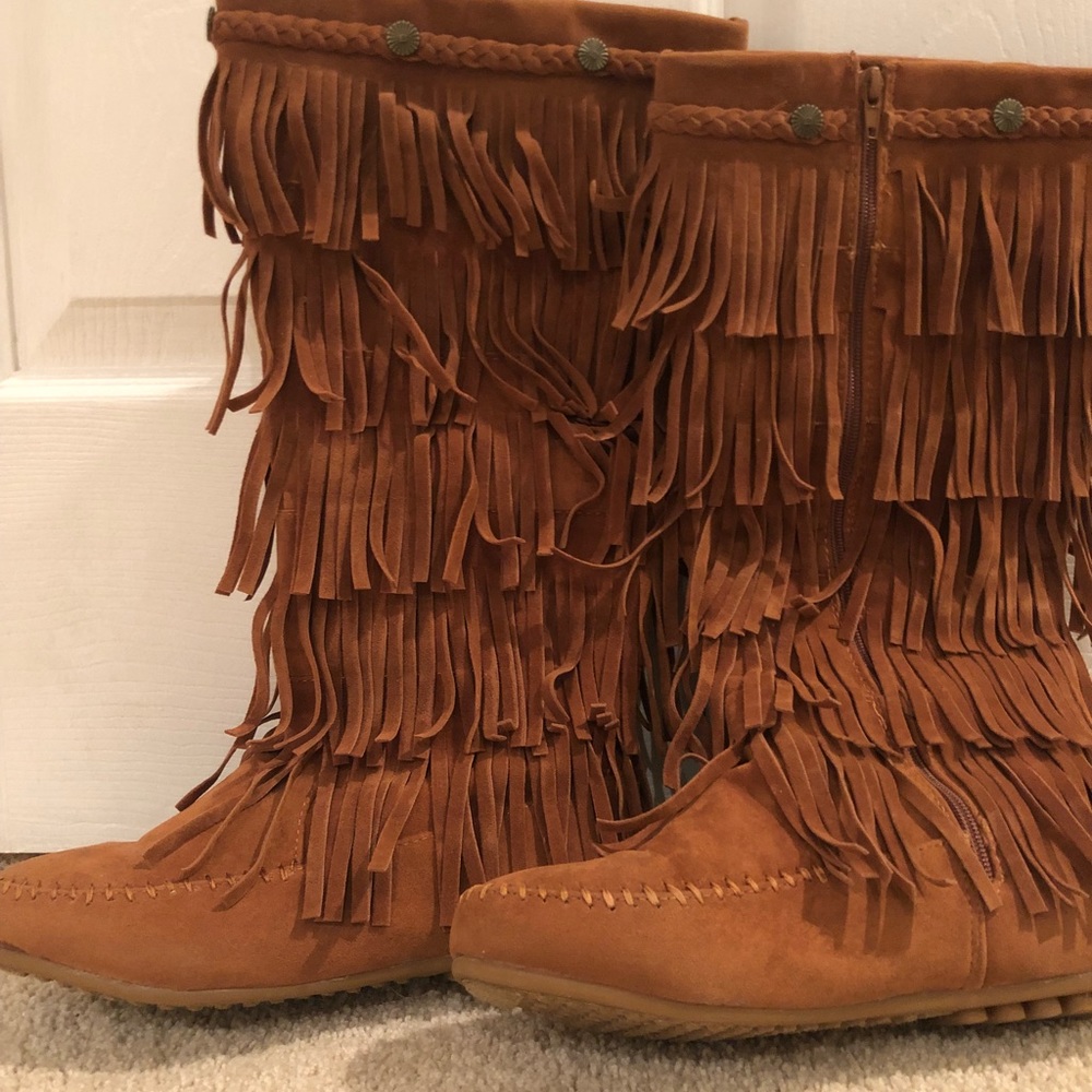 Tall fringe boots